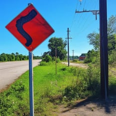 A sign on a pole